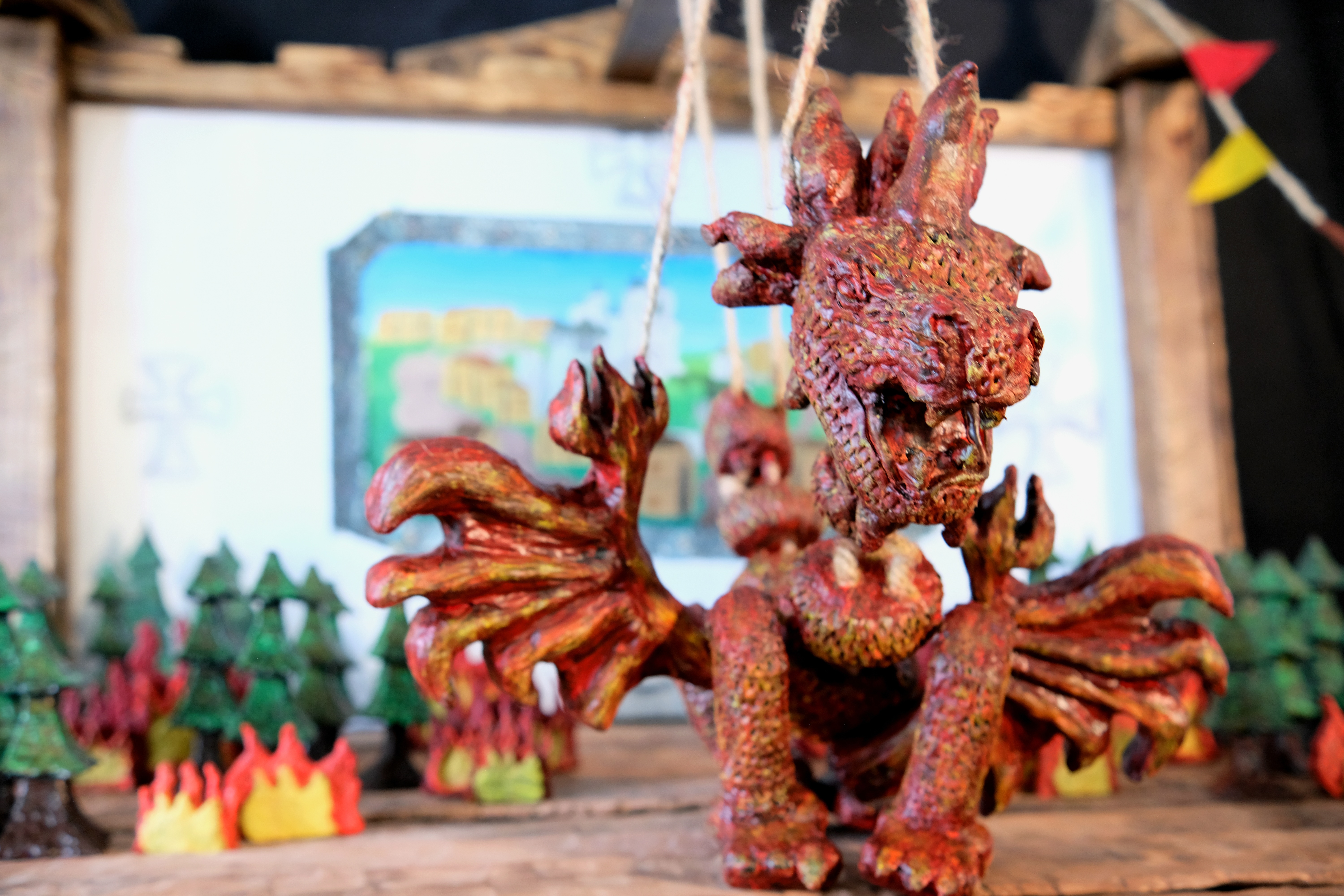 Beauty shot of Dragon puppet and theatre set