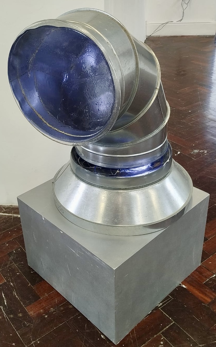 Marie Noonan,**R_dact_d**,2026, Industial pipe, epoxy resin, recording tape, light and sound.