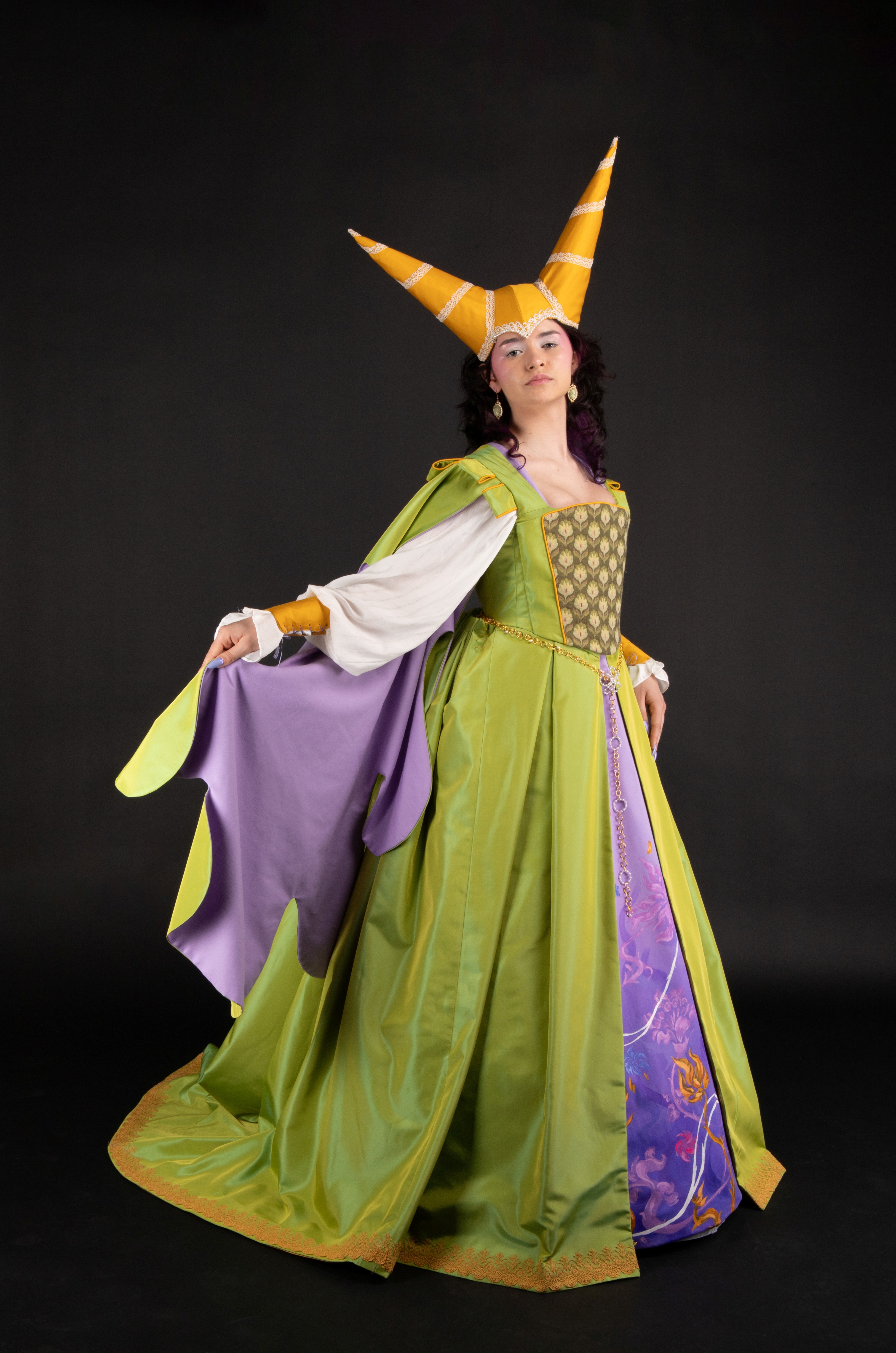 Full view of costume for Queen Magrat, hennin, kirtle, and overgown