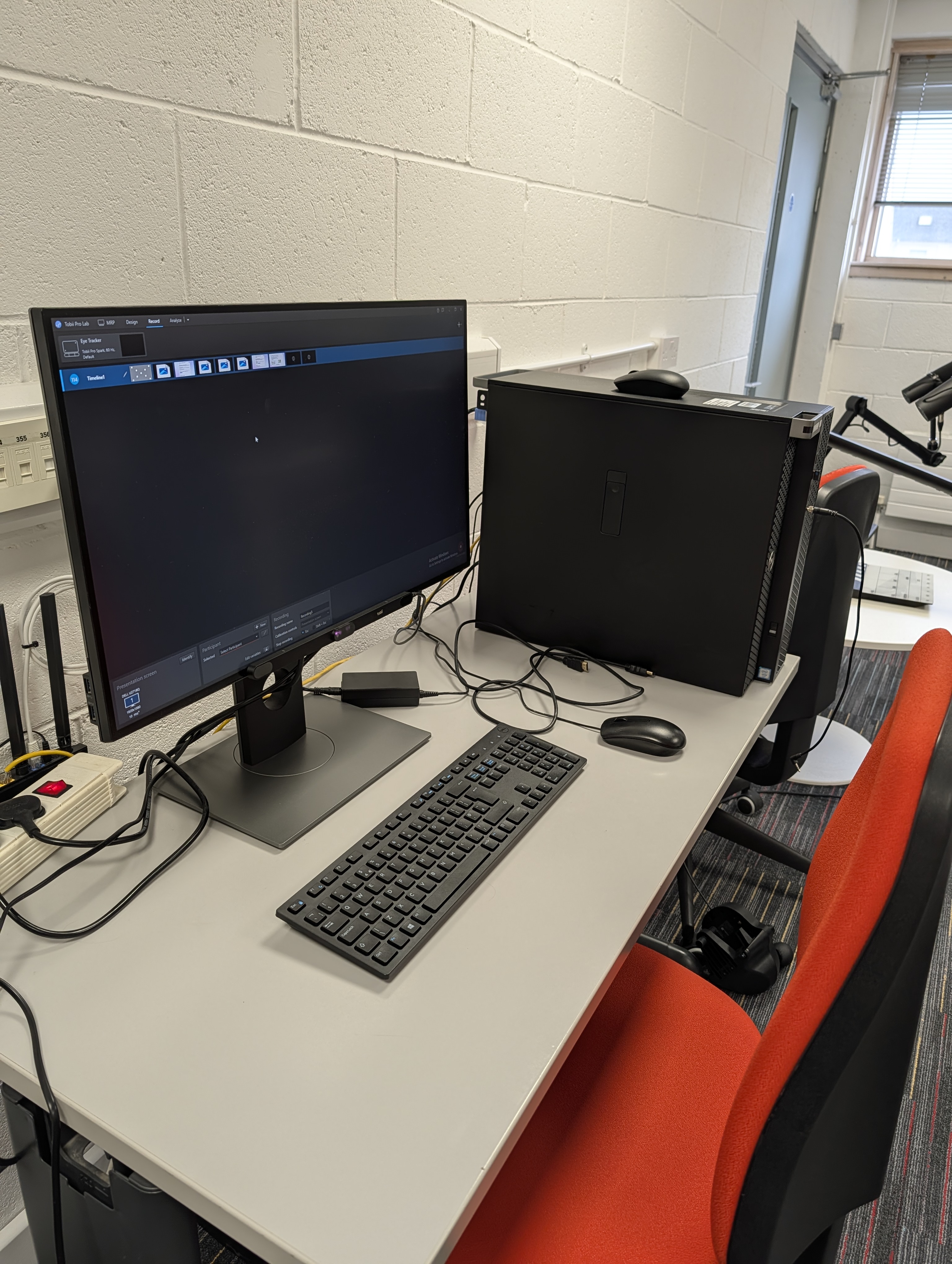 labratory setup with and eye tracker bar mounted on the bottom of computer monitor