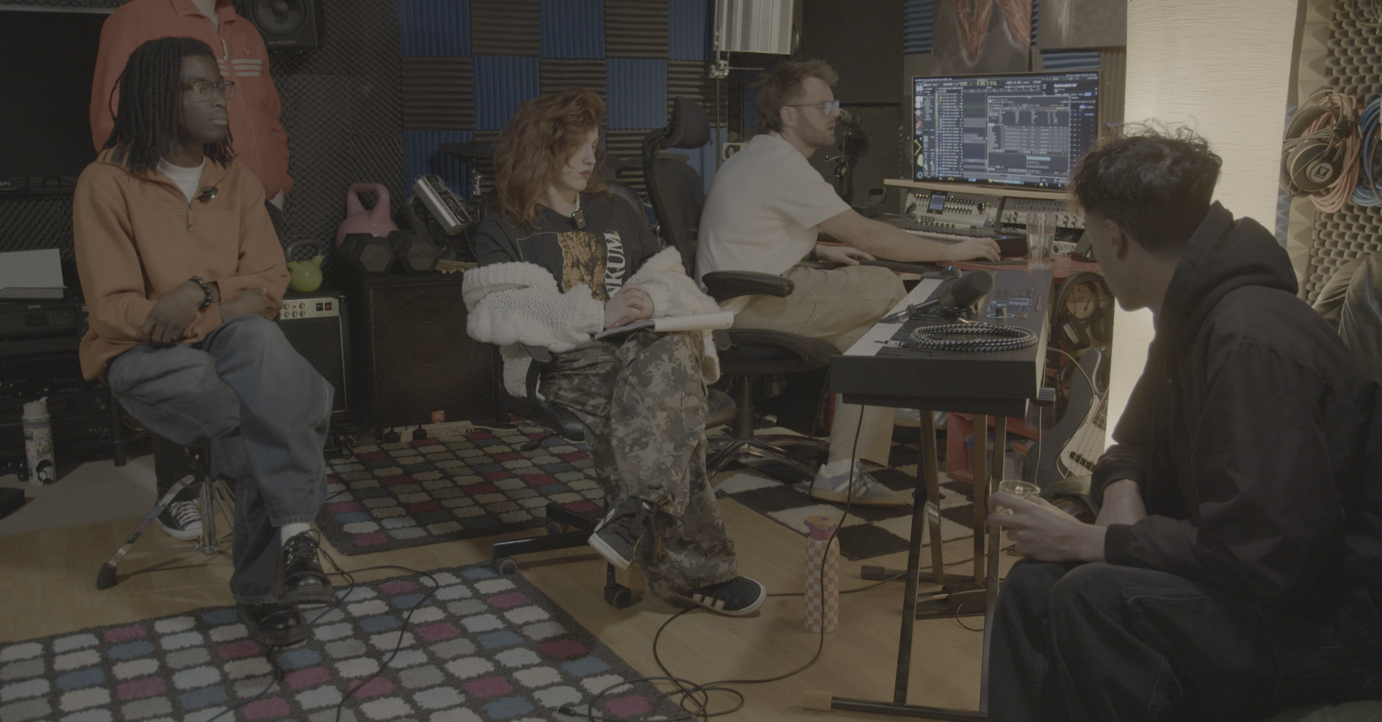 musicians sitting in studio
