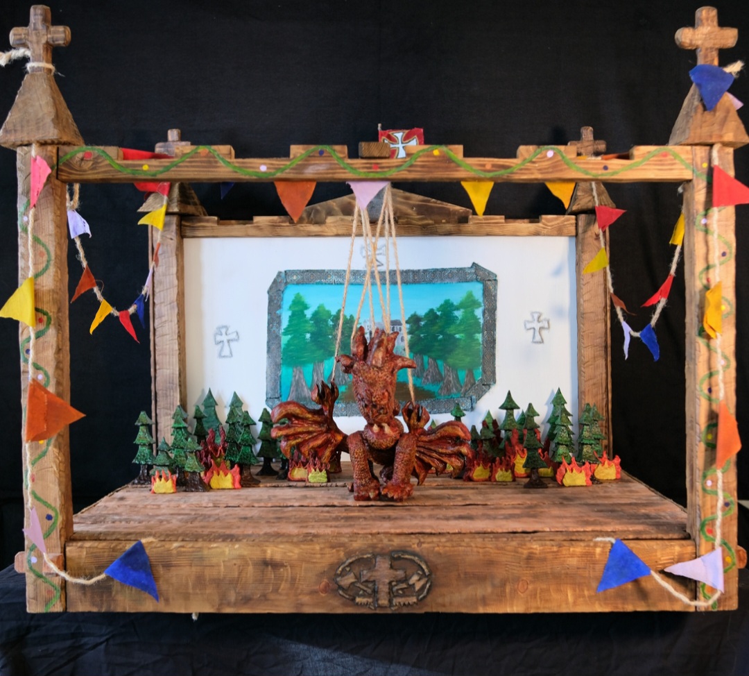 Beauty shot of Dragon puppet and theatre set