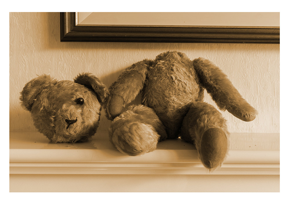 A teddy bear with its head decapitated 