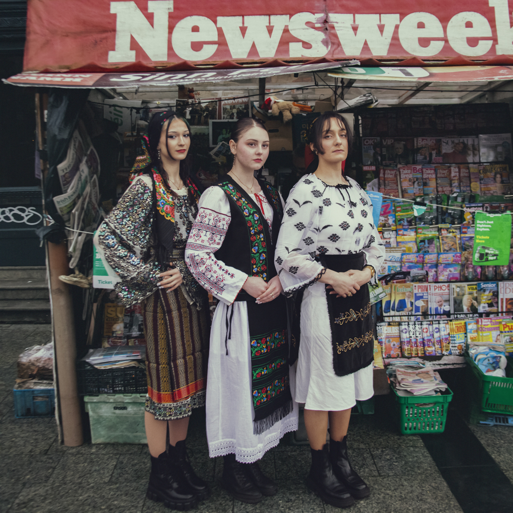 three eastern european women standing outside in O'Connell Street