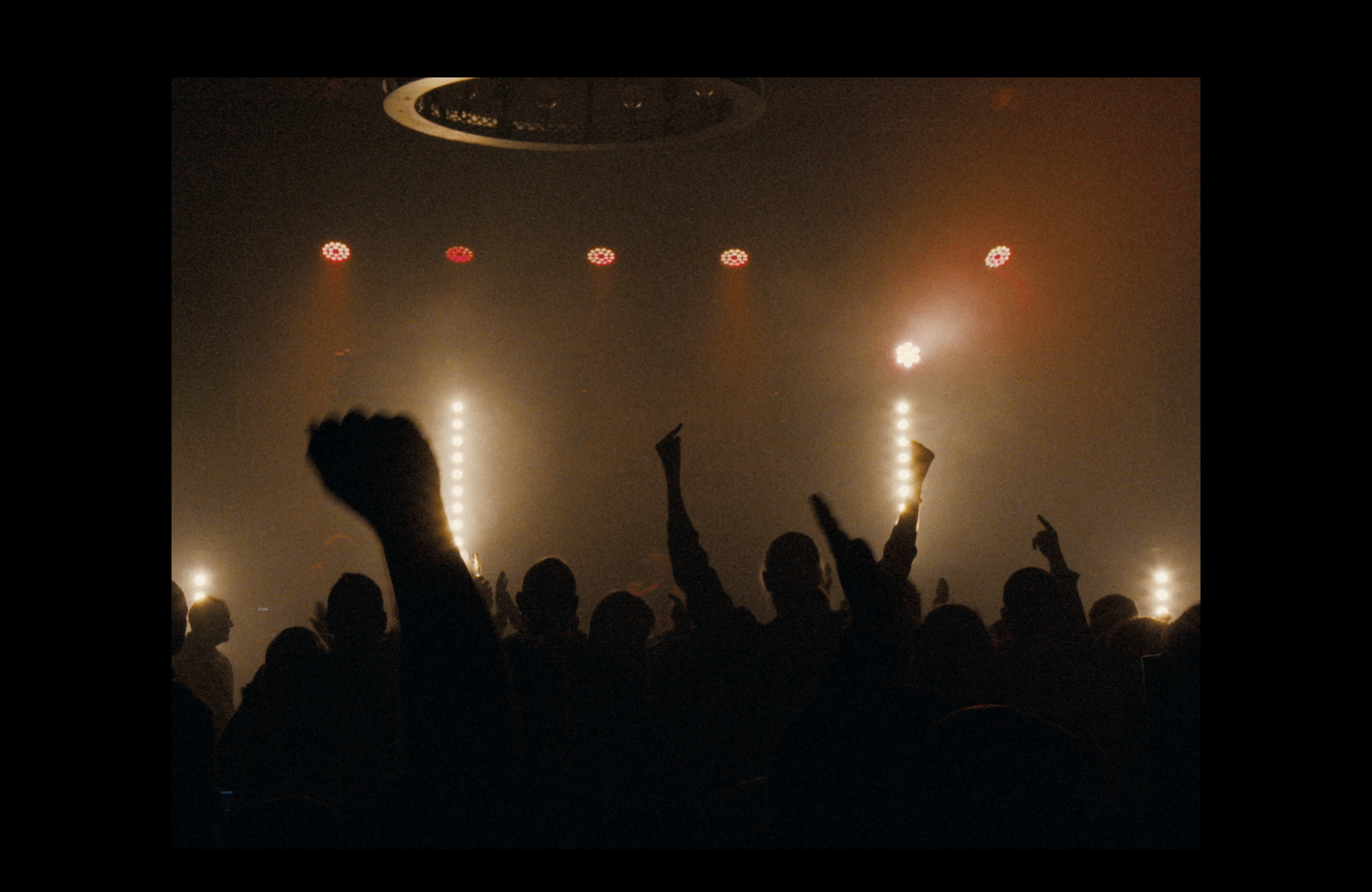 still from A Place to Stand - crowd at X-Ray's gig in Kellys