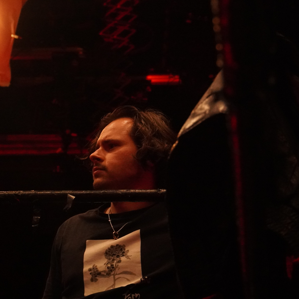 Photo of Karl directing in the wrestling ring for his final project