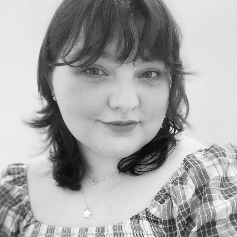 a headshot of lami dooley.